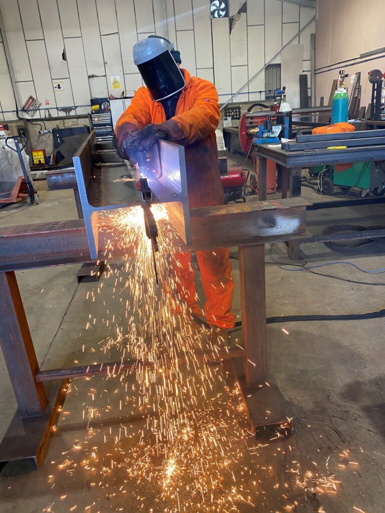 An employee of LTR Welding carrying out welding within their Kent Workshop